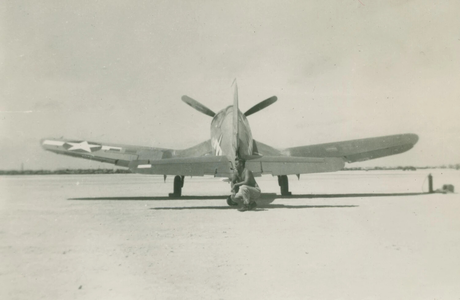 Fighter Aircraft (P-47 Thunderbolt type) Rear View with Ground Crewman, McAleer Album