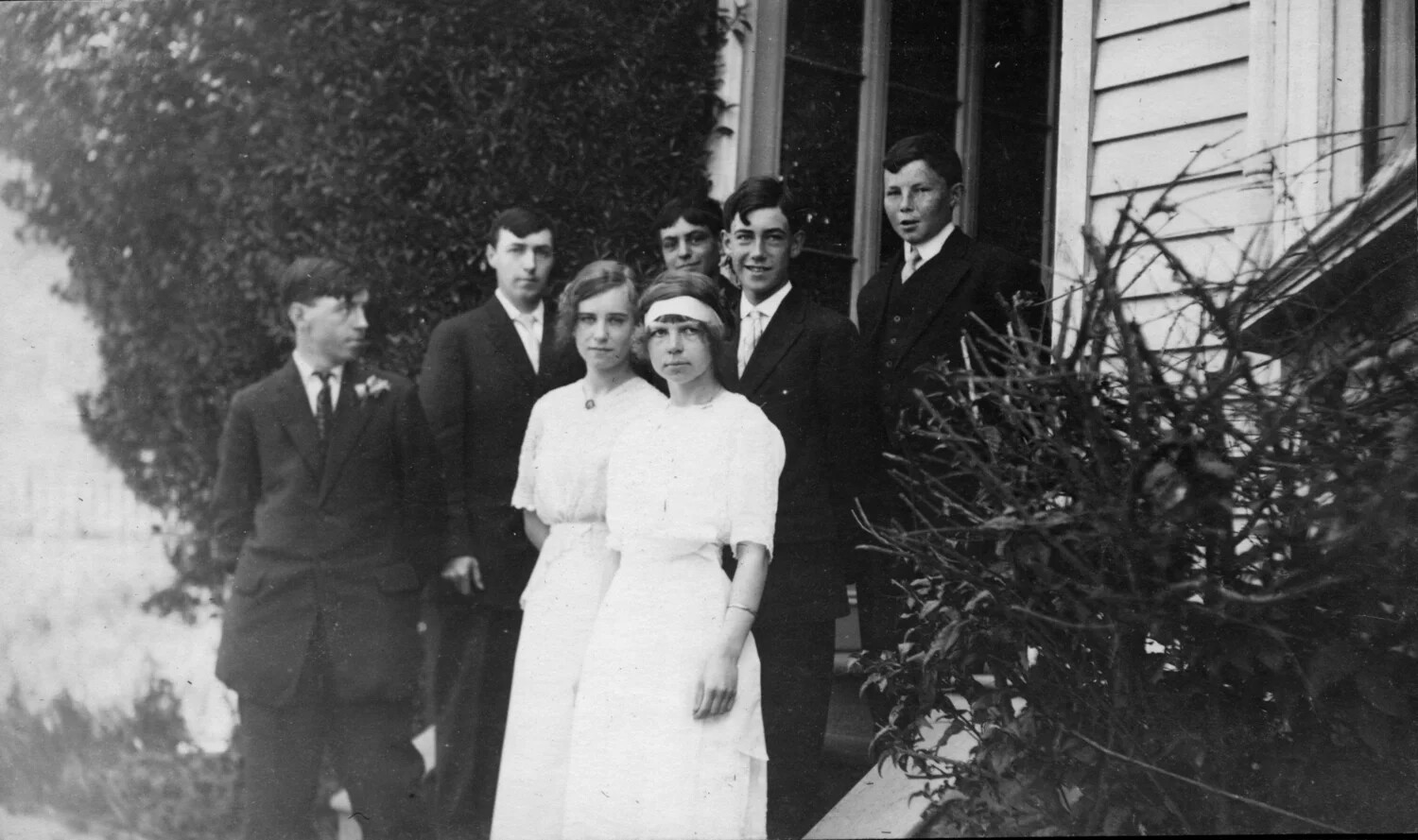 Group Portrait of Young Men and Women on a Porch, c. 1918-1922