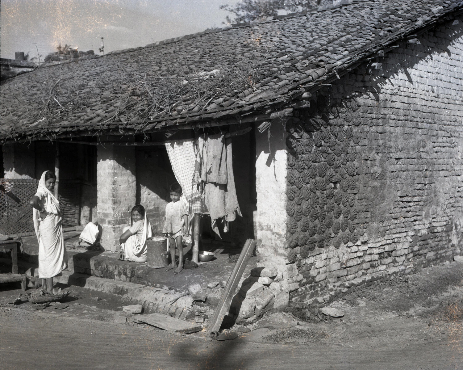Rural Indian Village House with Family, WWII China-Burma-India Theater Collection