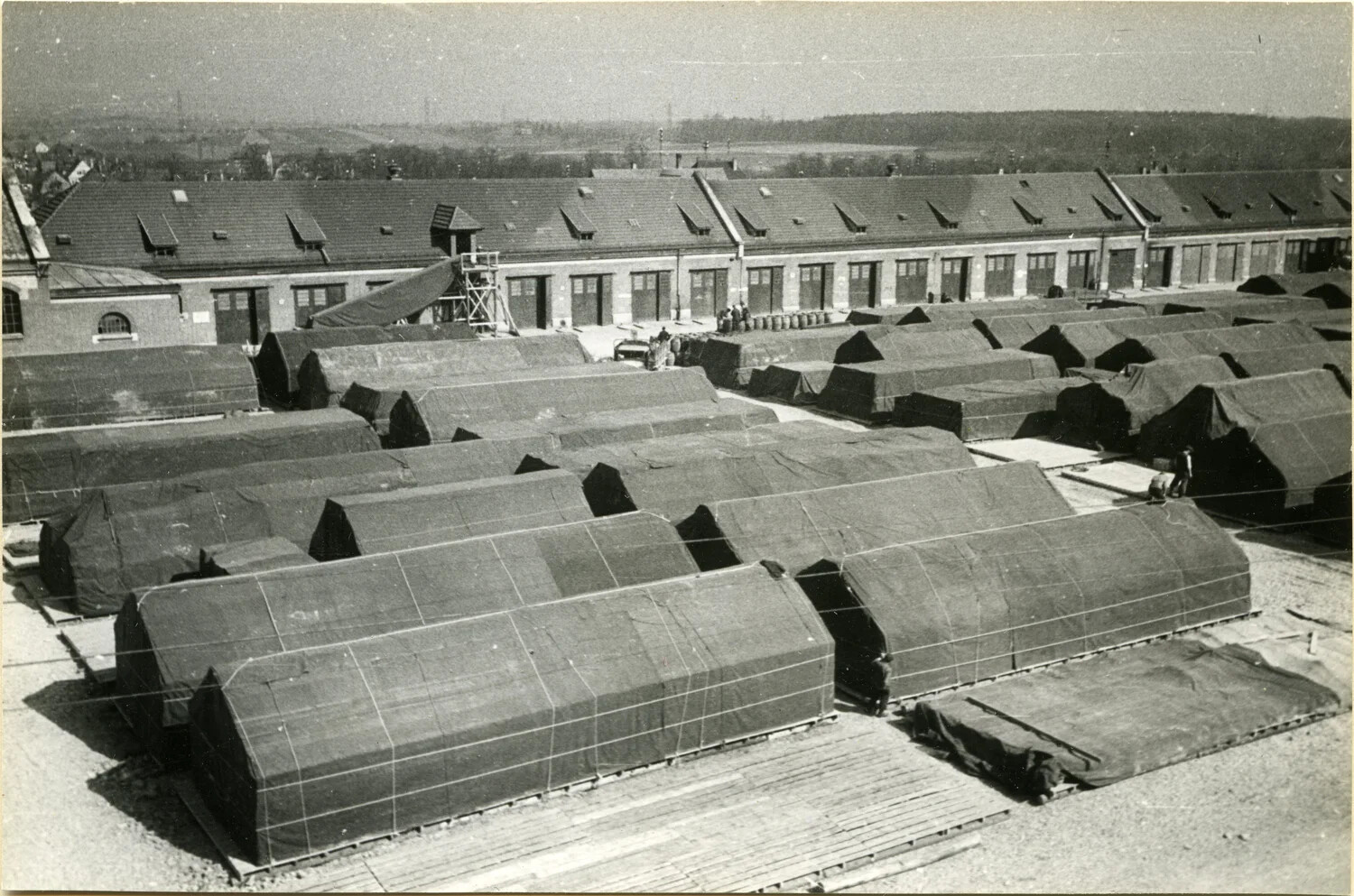 Tent Encampment Adjoining Barracks Complex, Germany Depot
