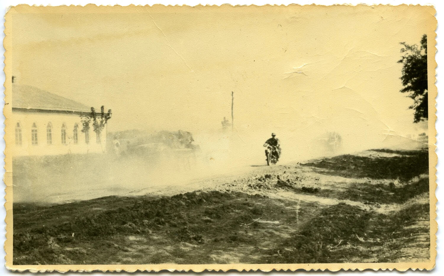 German Motorcyclist on Dusty Road, Eastern Front, WWII