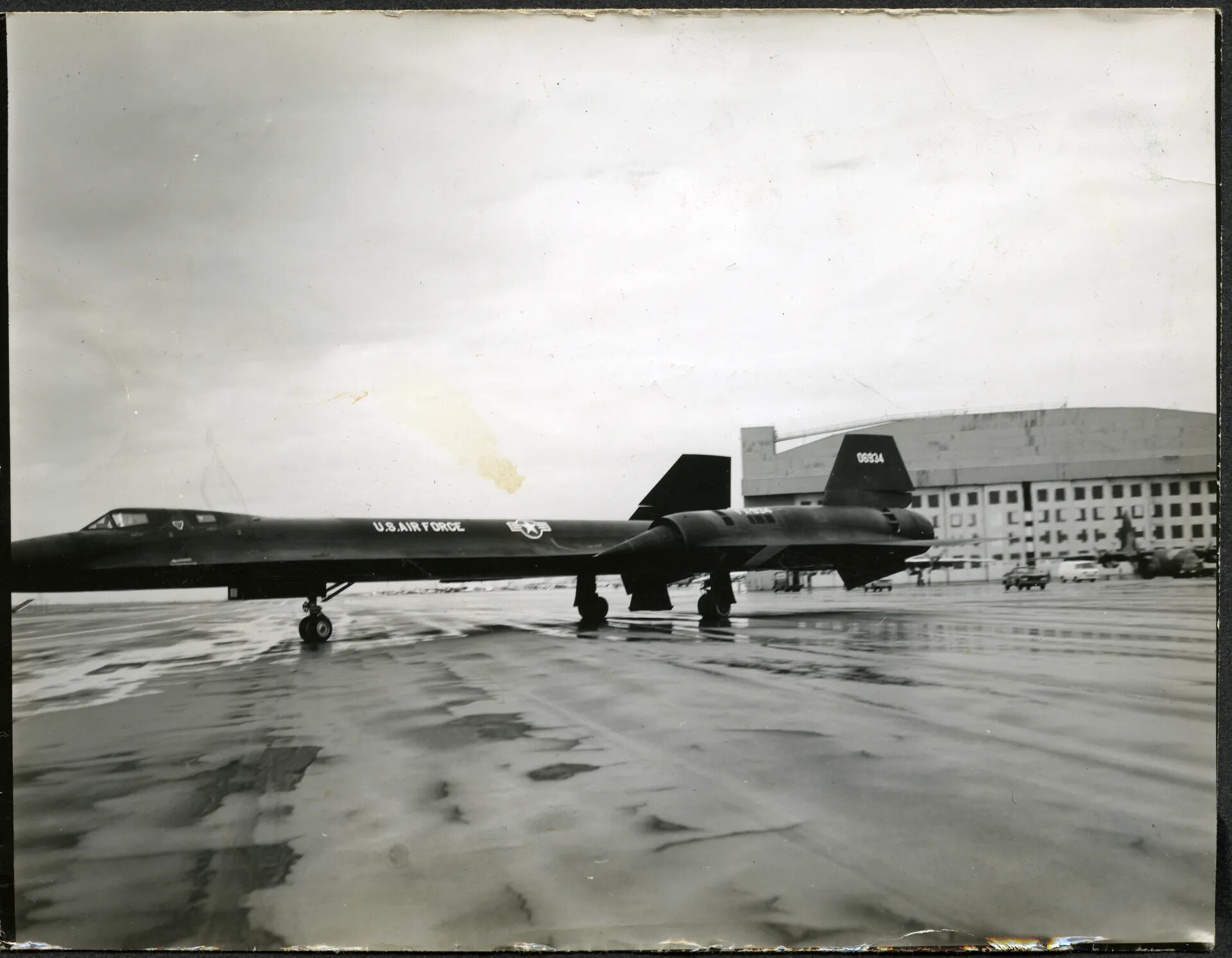 SR-71 Blackbird Reconnaissance Aircraft on Wet Ramp