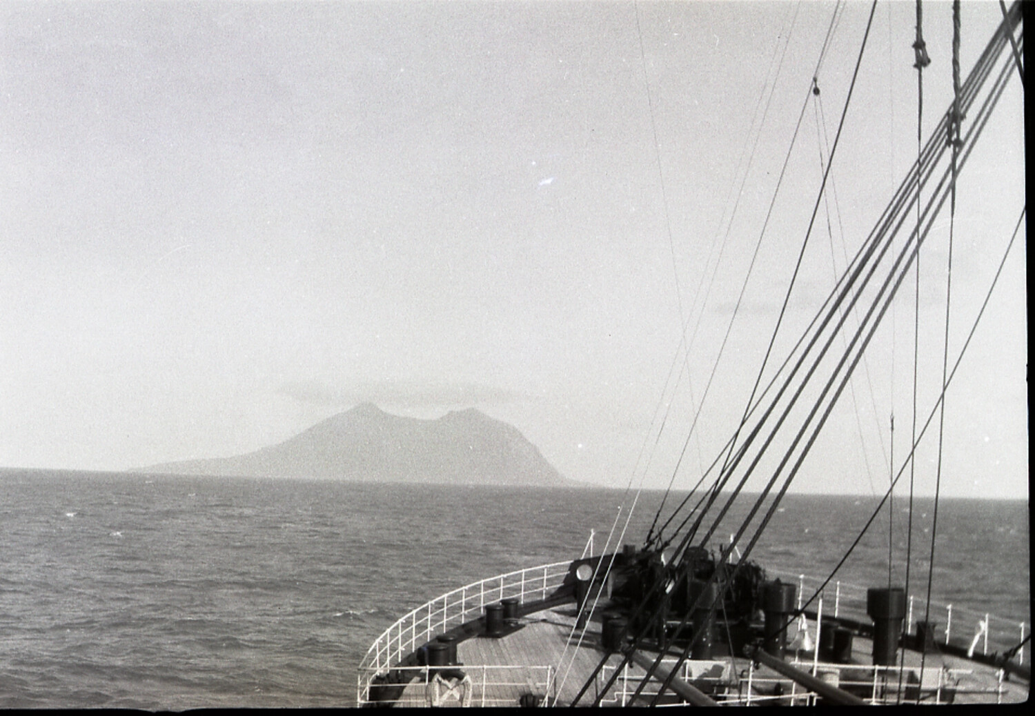Ship's Bow Approaching a Volcanic Island, Transpacific Voyage