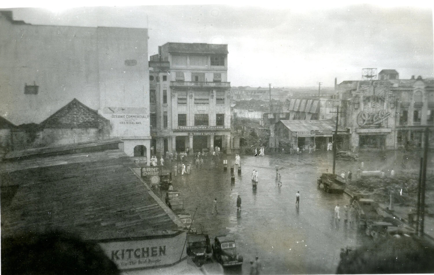 Elevated View of Rizal Avenue, Manila, Showing War Damage and Street Life, WWII Photo Album