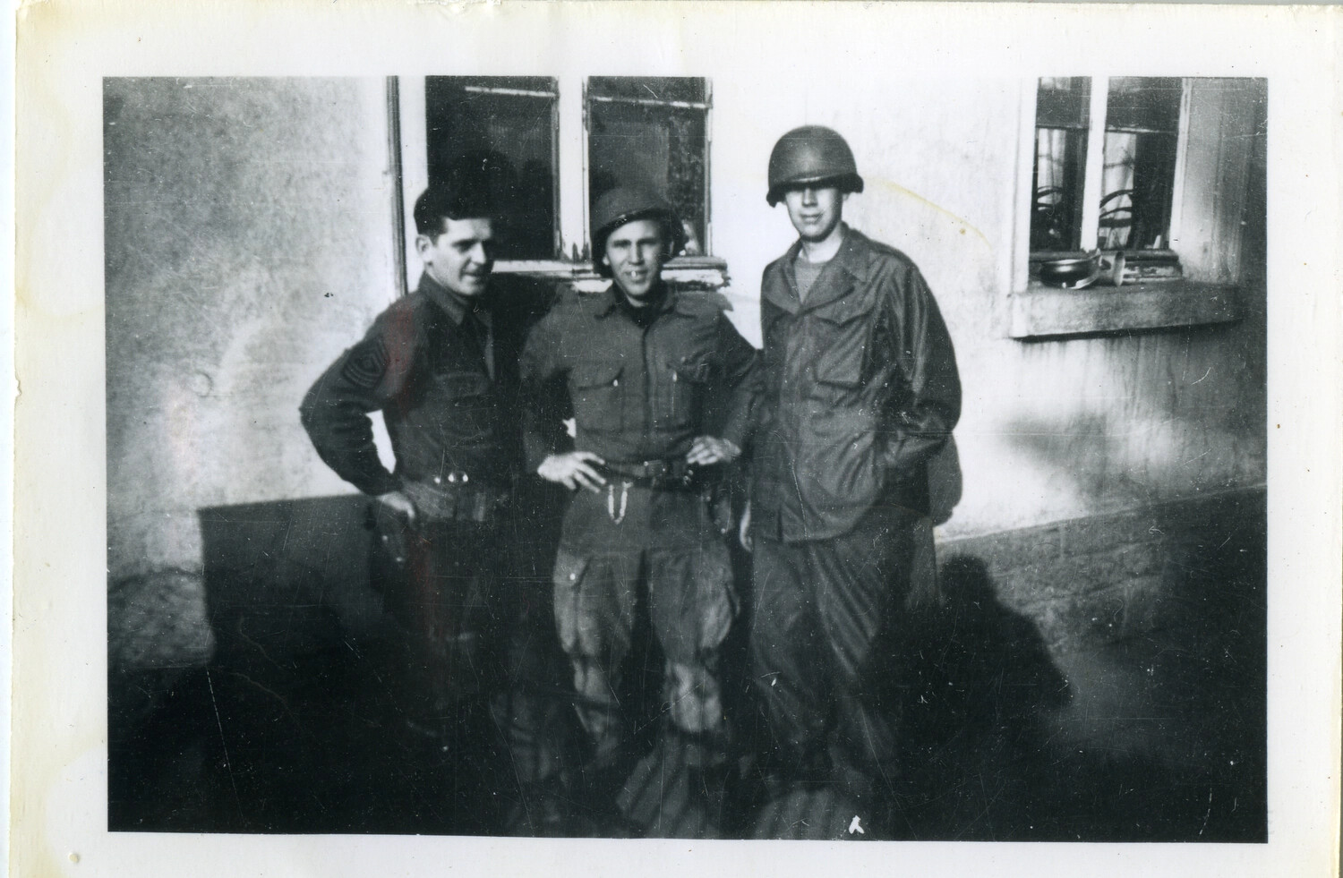 Three Soldiers of the 101st Airborne Division Outside a Billet, European Theater, World War II