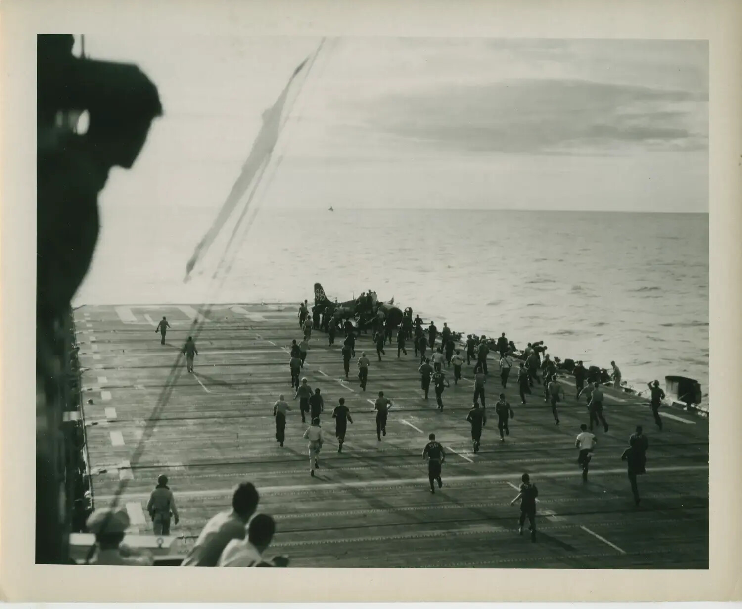 Flight Deck Crew Rushing to Aircraft, USS Petrof Bay (CVE-80), WWII