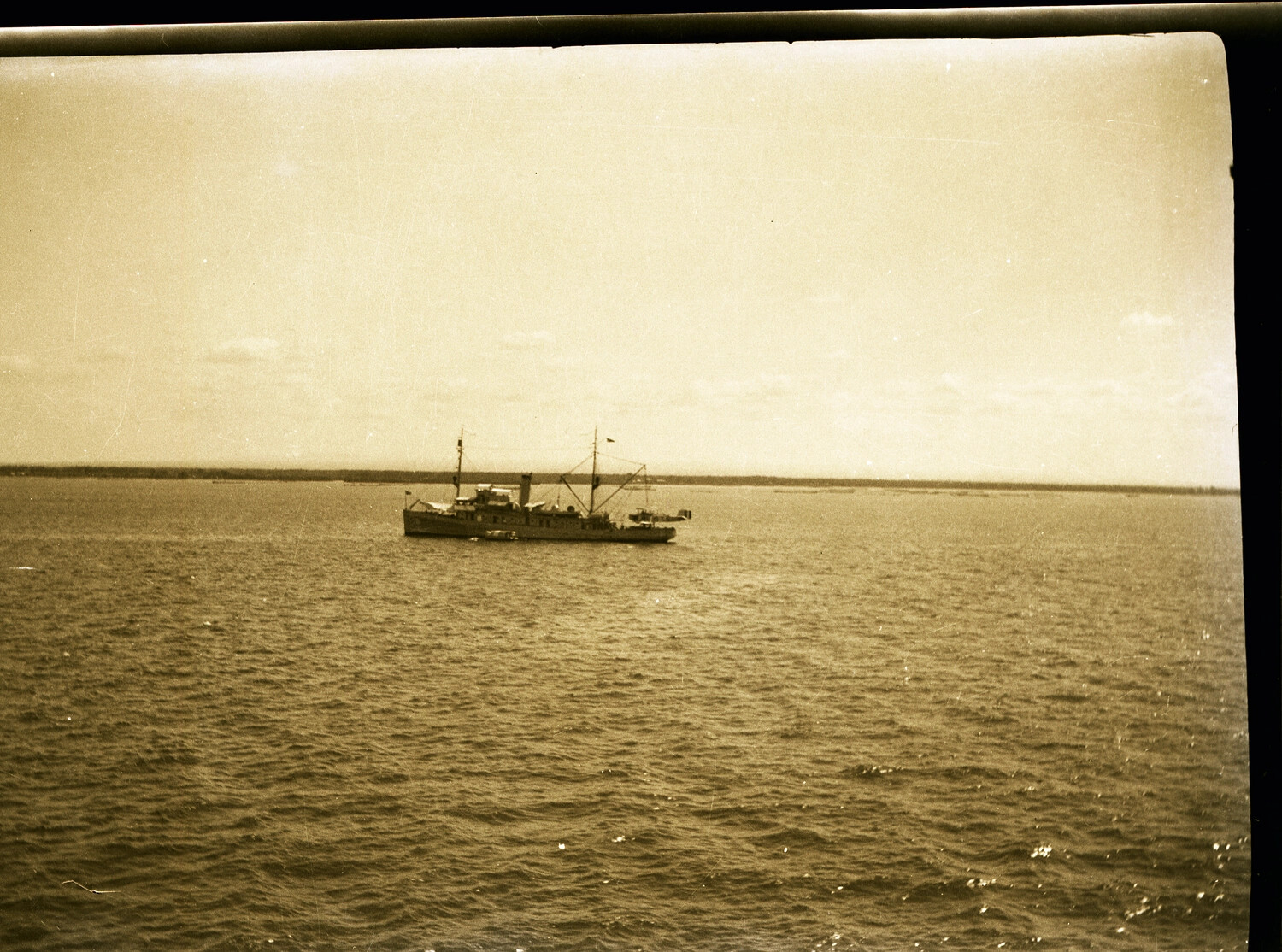 Small Naval Vessel at Anchor, China Coast or River, circa 1930s - US Navy Asiatic Fleet/Yangtze Patrol Collection