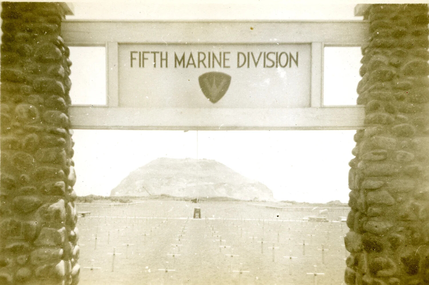 Fifth Marine Division Cemetery Gateway with Mount Suribachi in Background, Iwo Jima, 1945