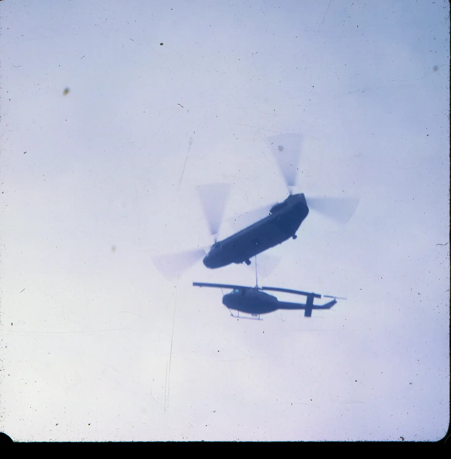CH-47 Chinook Sling-Loading a UH-1 Huey Helicopter, Vietnam War