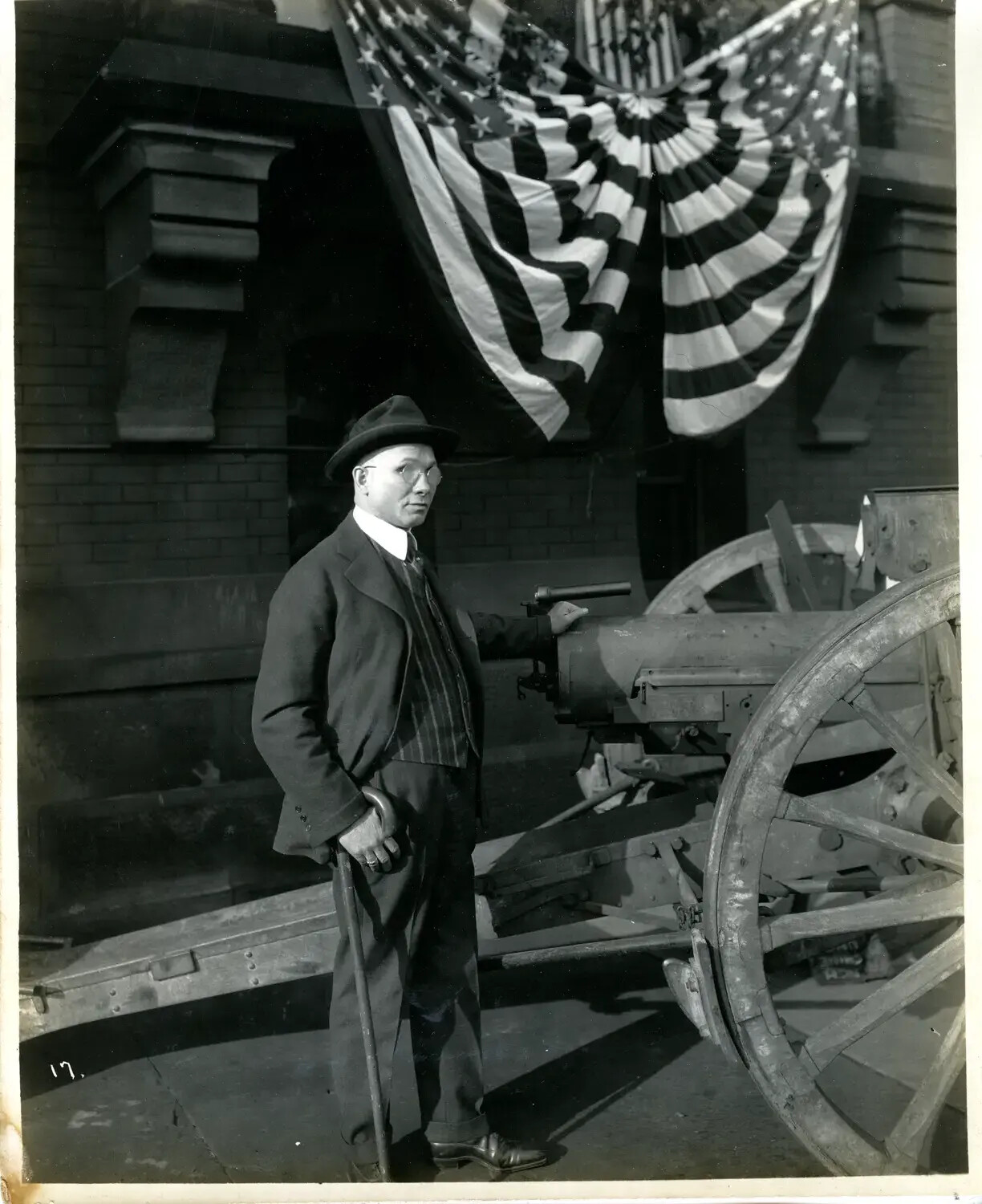 Civilian Official Posing with Captured Field Gun at WWI War Trophy Display