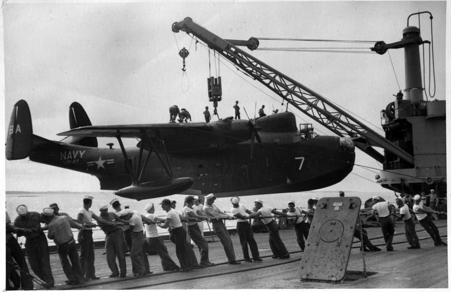 Martin PBM-5 Mariner Hoisted Aboard Seaplane Tender, VP-47, Korean War Era