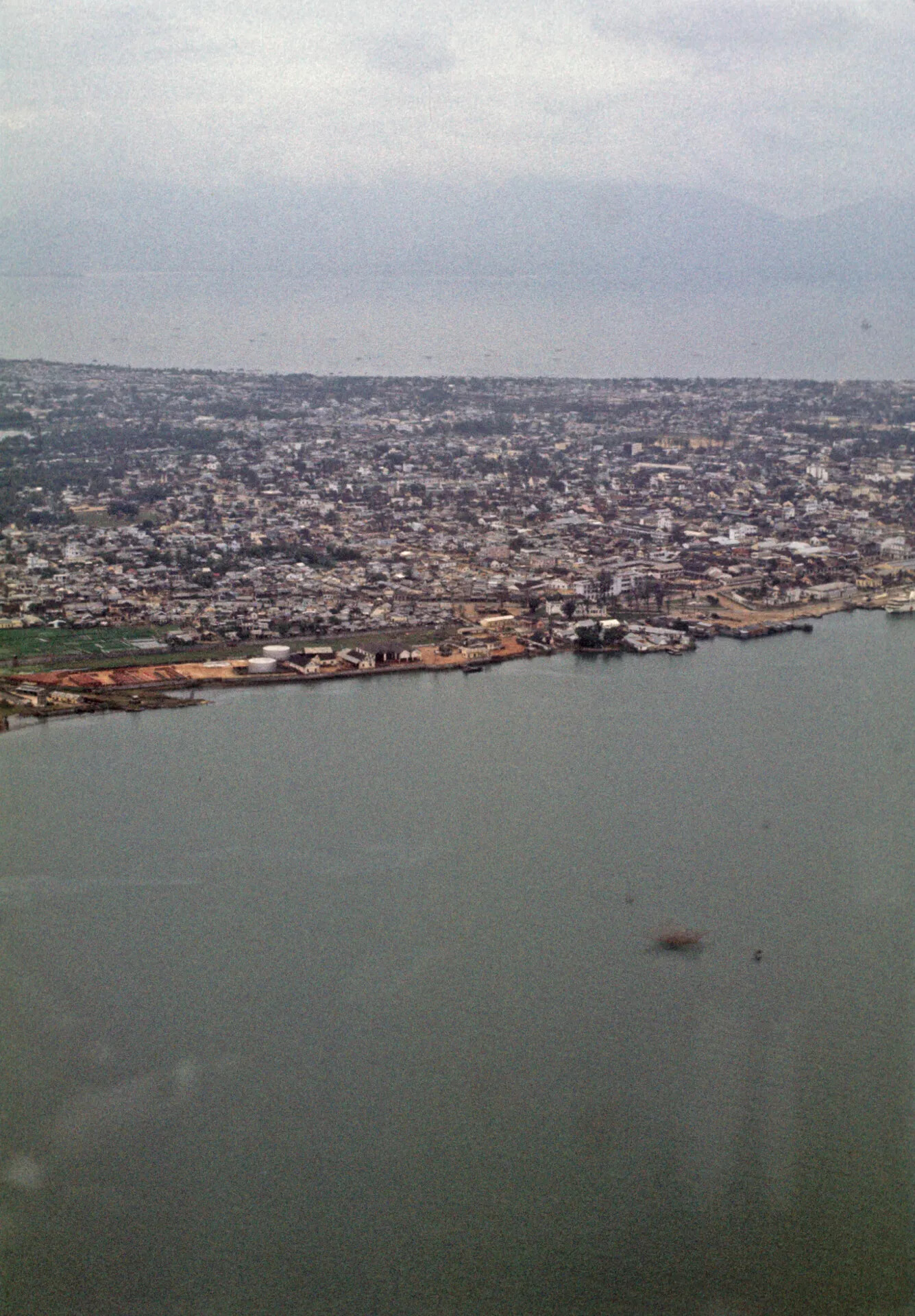 Aerial View of Coastal City and Harbor