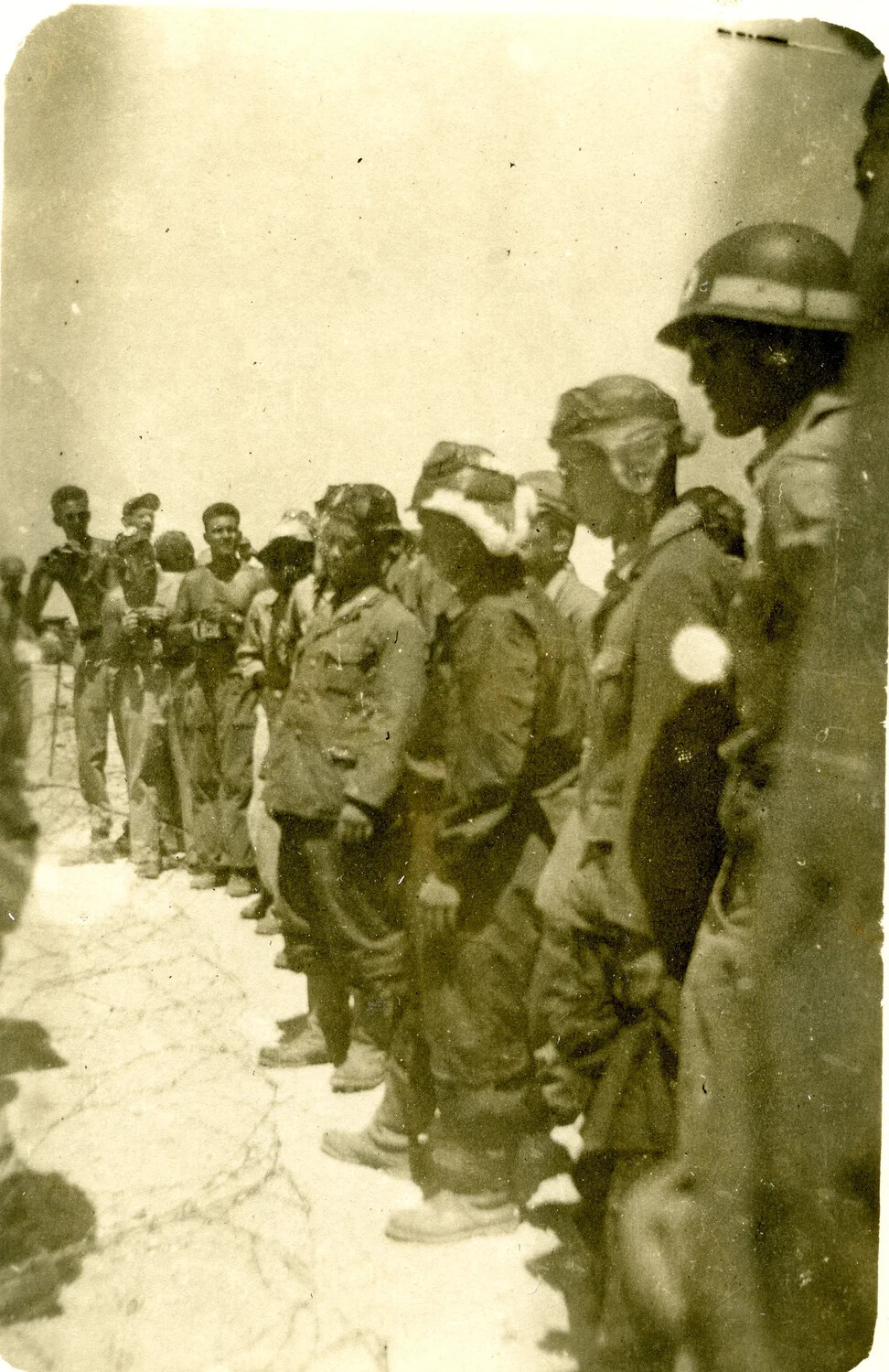Line of Personnel on Airfield, Possibly Japanese Envoy Delegation, Ie Shima, August 19, 1945