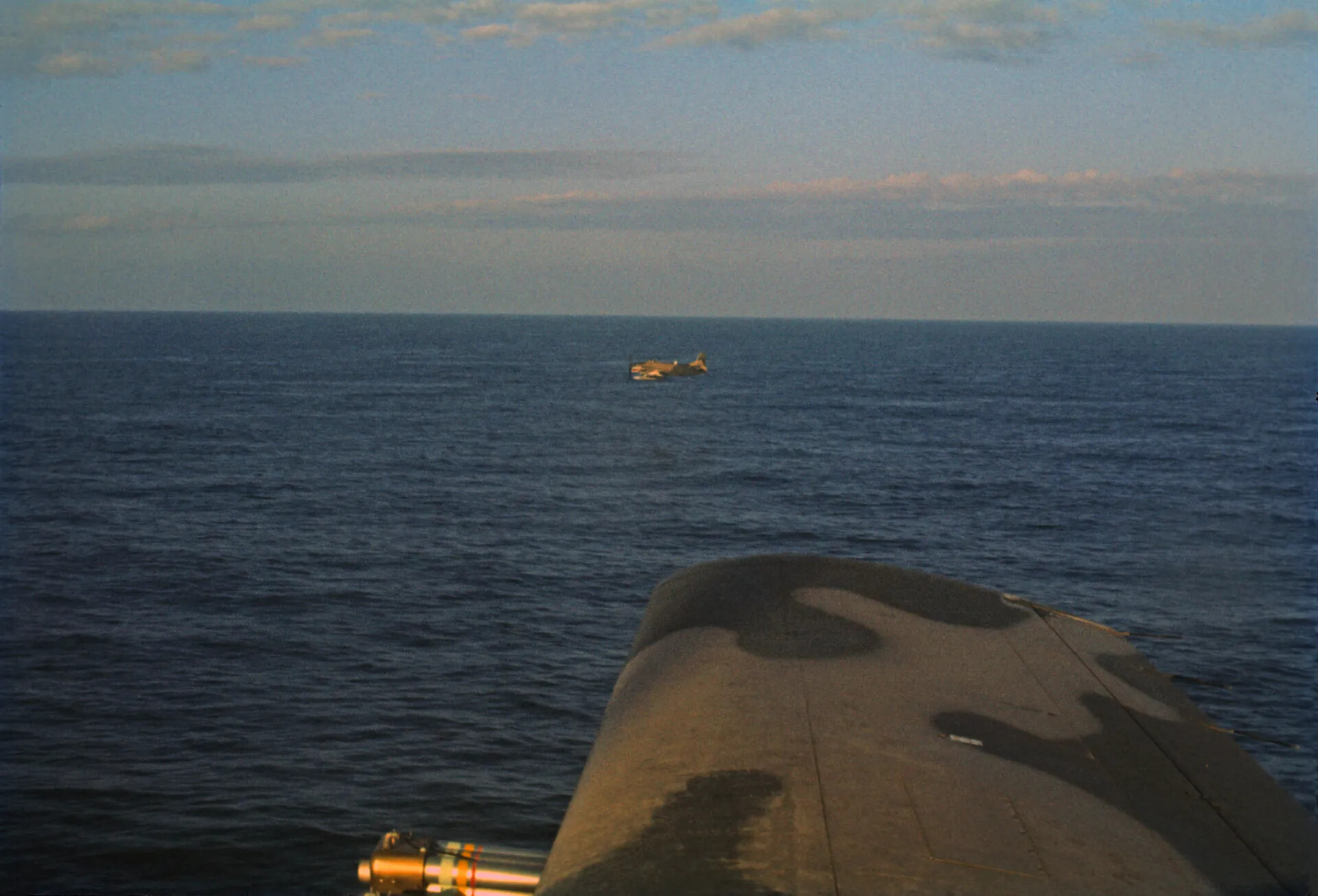 A-1 Skyraider Flying Low Over Open Water at Dusk, Air-to-Air Photograph, 1969, Don Engebretsen Collection