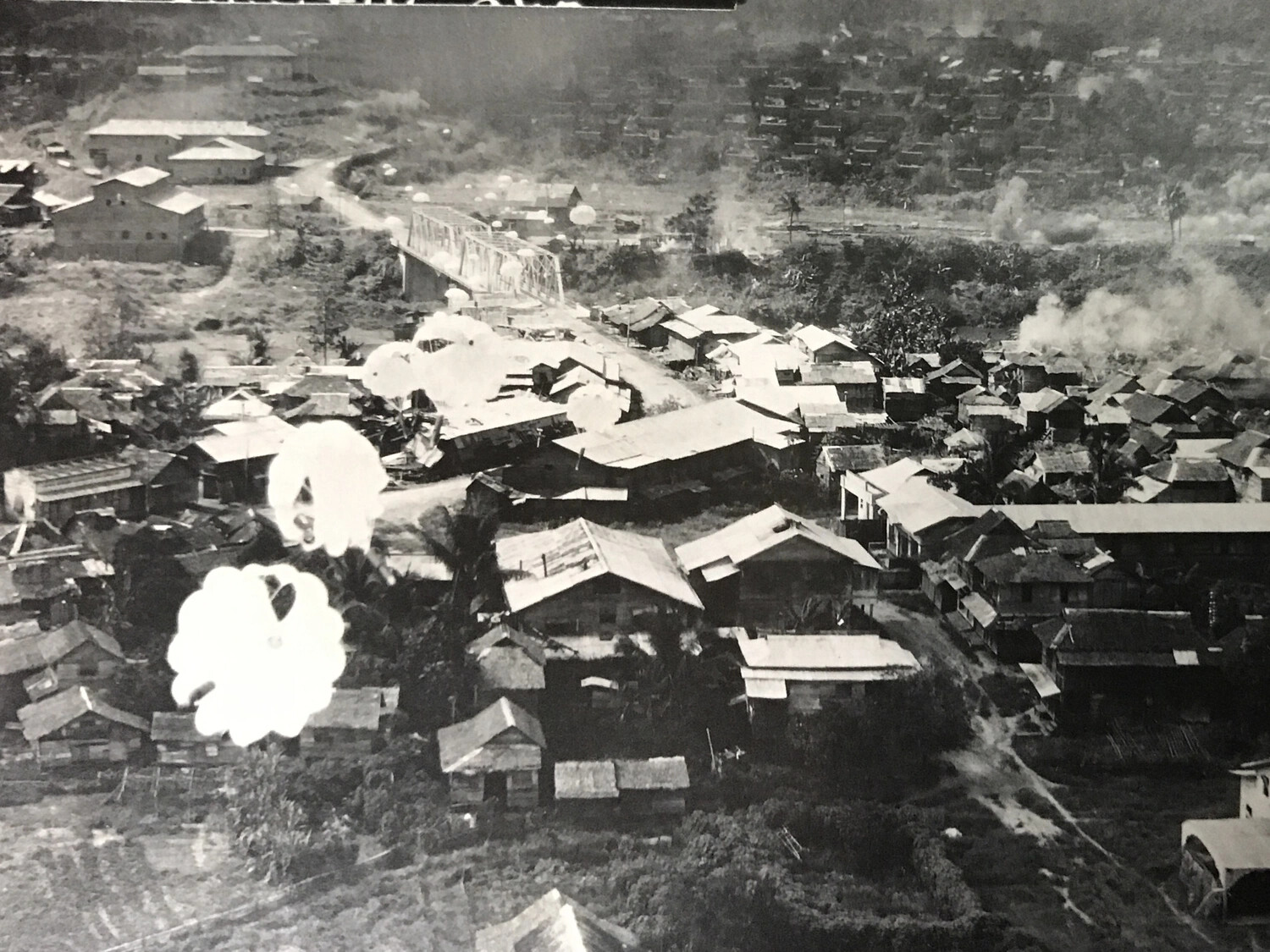 Parafrag Bombing Strike Over Village and Bridge, Luzon Campaign, 312th Bomb Group