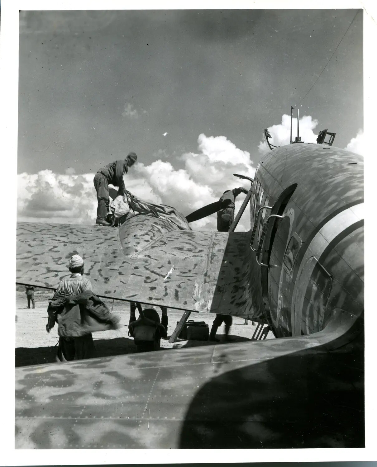 Ground Crew Servicing Camouflaged Aircraft, CBI Theater, WWII