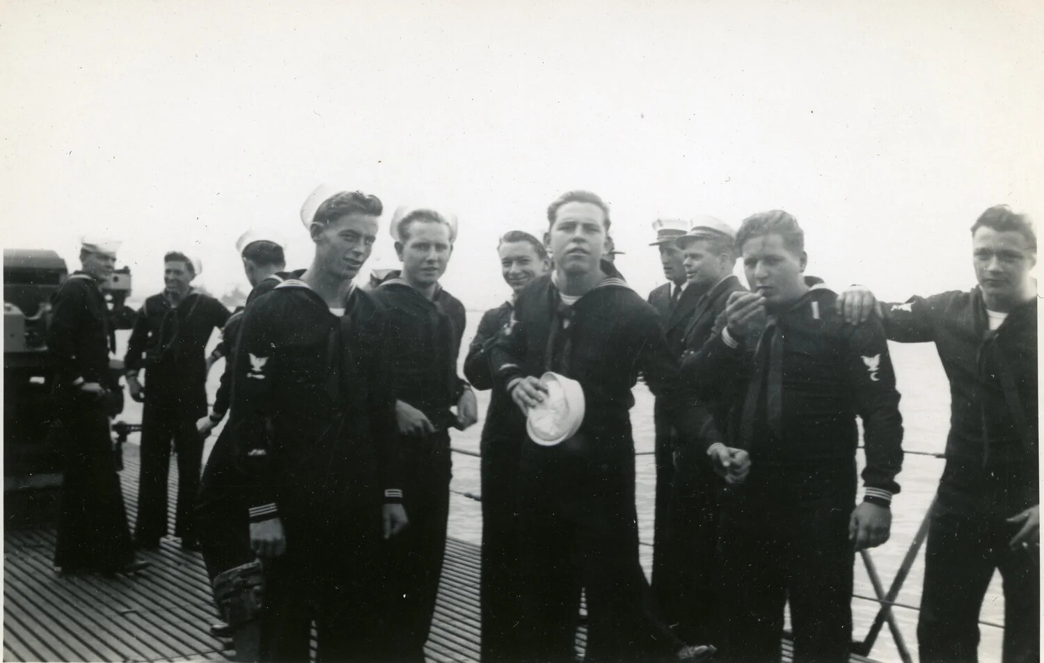 Informal Group Portrait of Submarine Crew on Deck, WWII Era