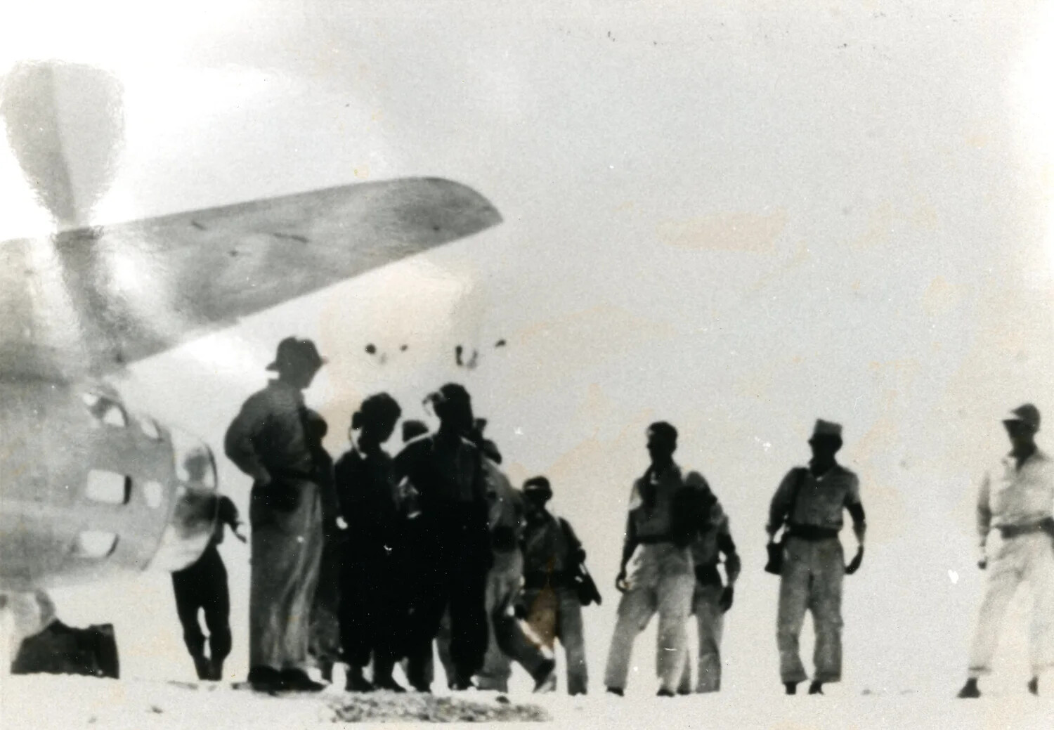 Group of Servicemen and Officials Beside the Envoy Bomber's Nose, Ie Shima, 19 August 1945