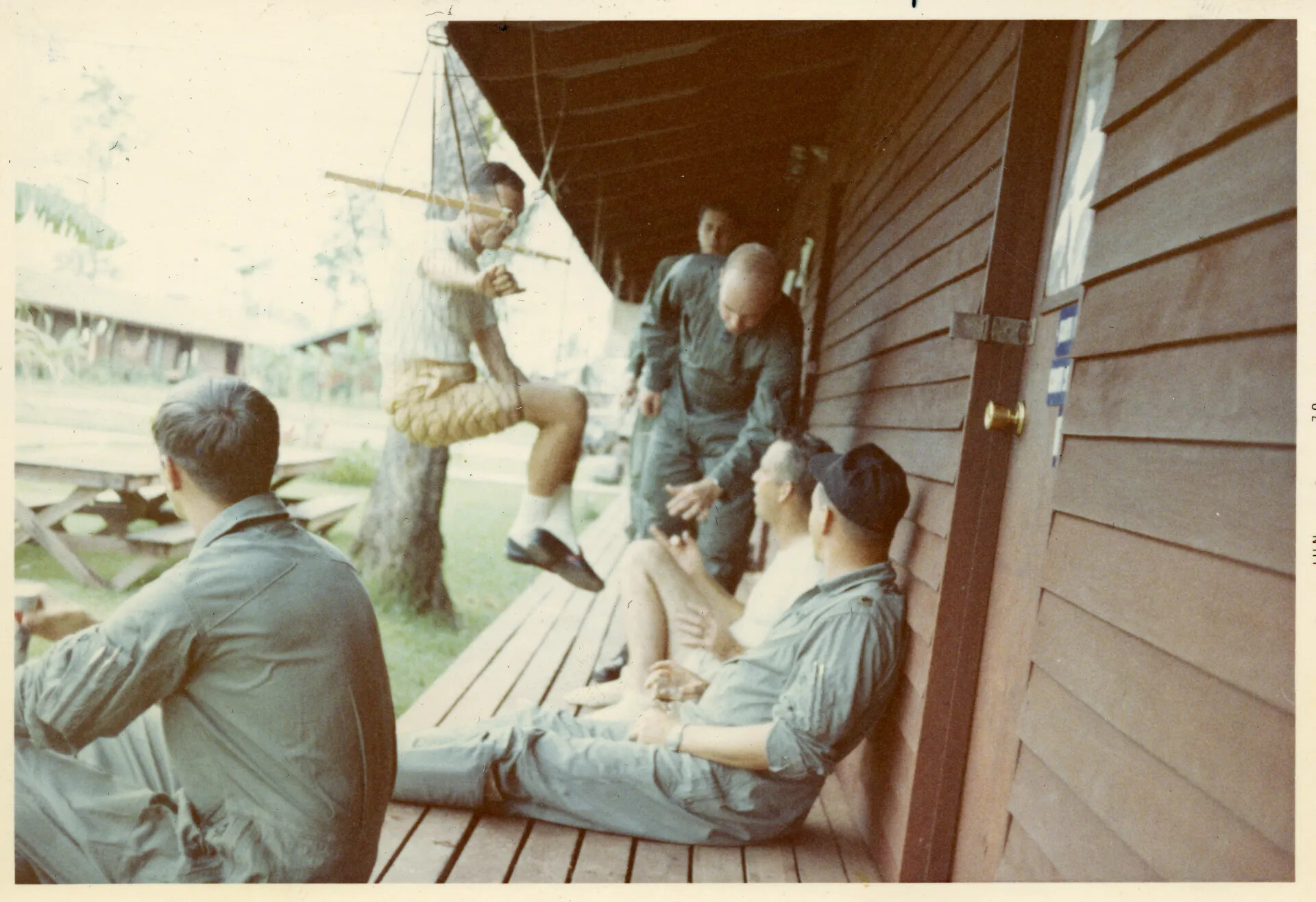Airmen Relaxing on Barracks Porch, Nakhon Phanom RTAFB (NKP)