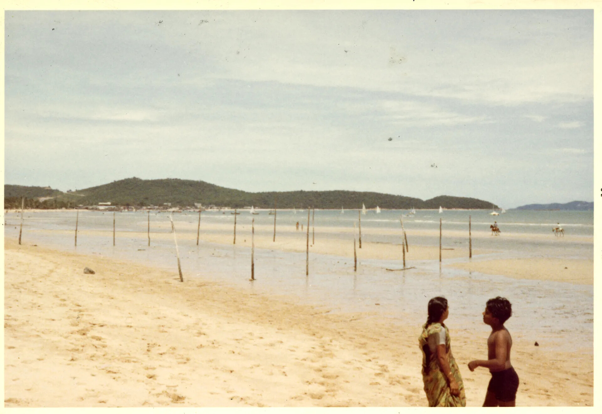 Vietnamese Children on Coastal Beach with Fishing Stakes, Doug Carmichael Collection