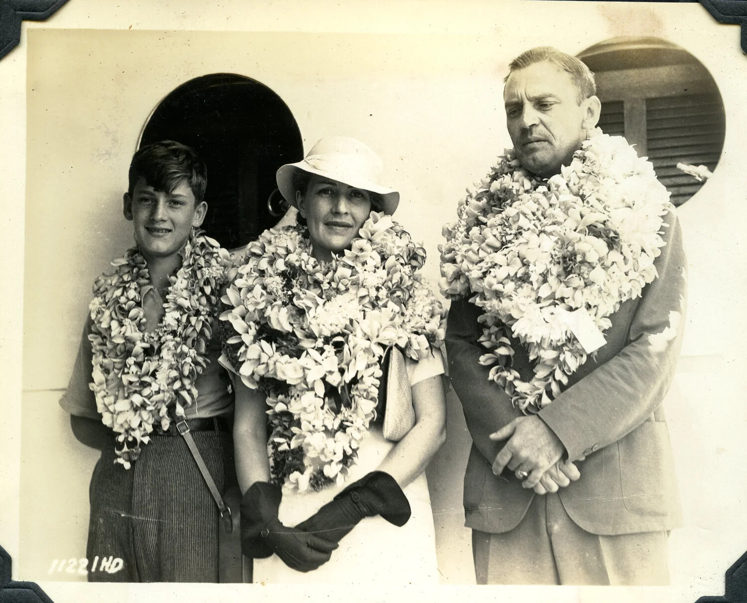 Family Arrival Portrait with Hawaiian Leis Aboard Ship, Jervey Family Photo Collection