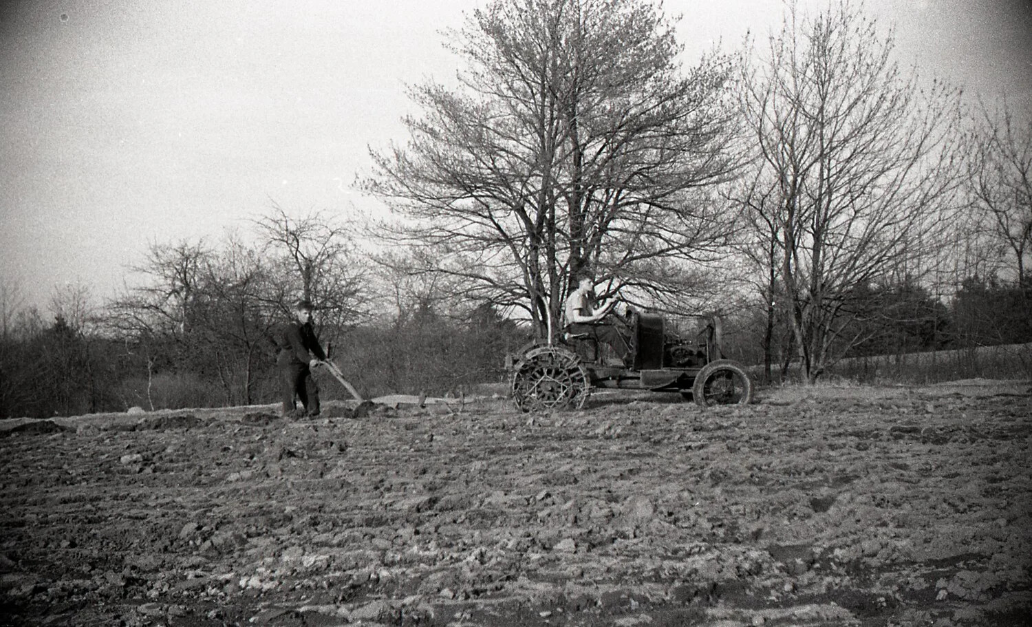 Farmers Plowing a Field with Vintage Tractor and Hand Implement, New England