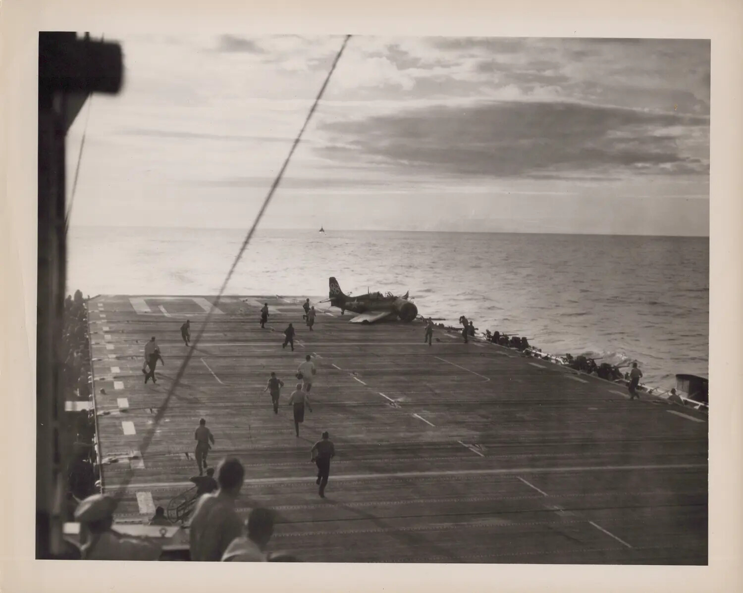 Deck Crew Rushing to a Crashed Aircraft, Escort Carrier Flight Deck, WWII