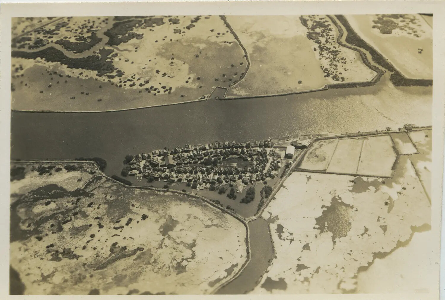 Aerial View of Riverside Village and Cultivated Fields, Pacific Theater, 312th Bombardment Group Collection, WWII
