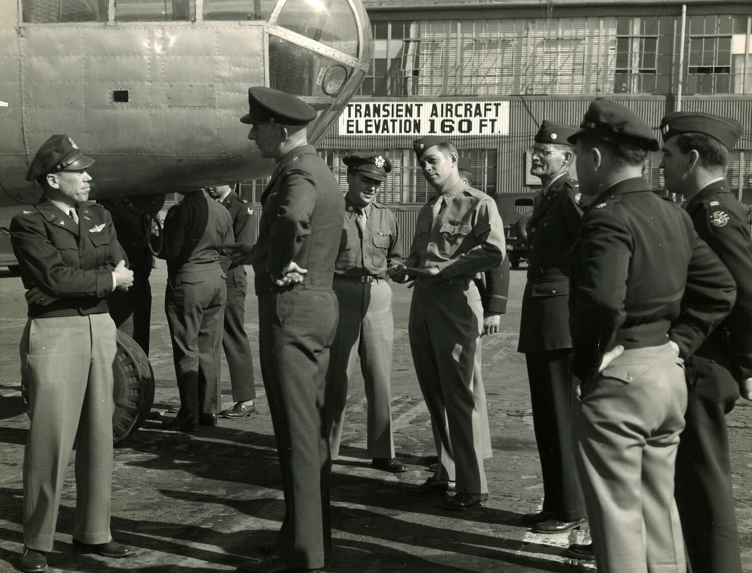 US Air Force Officers Beside Bomber Aircraft Nose, Japan/Korea Airbase, Postwar Era