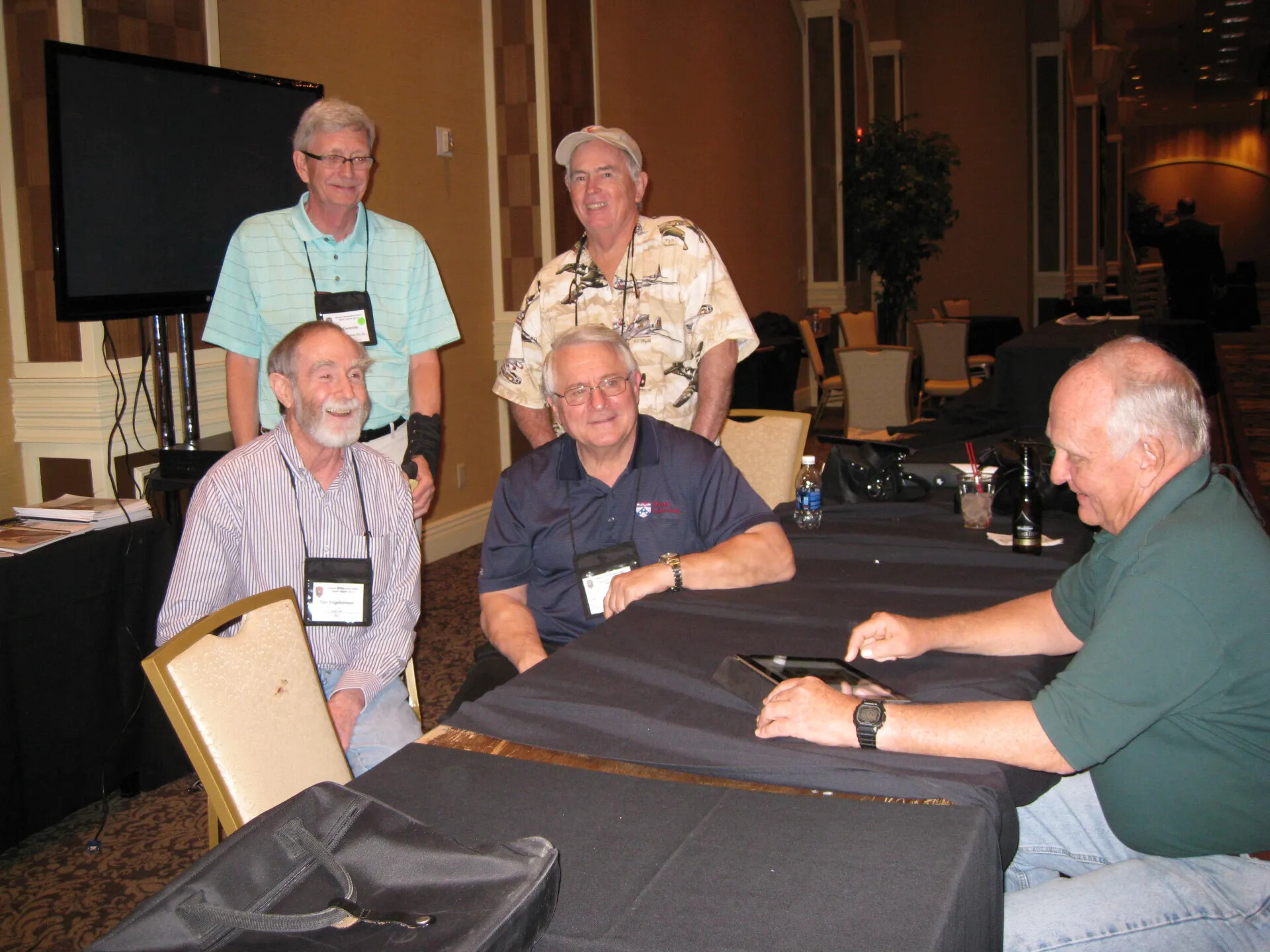 Attendees Reviewing Images on a Tablet Computer, Special Operations Association Reunion XXXVII, Las Vegas, 2013