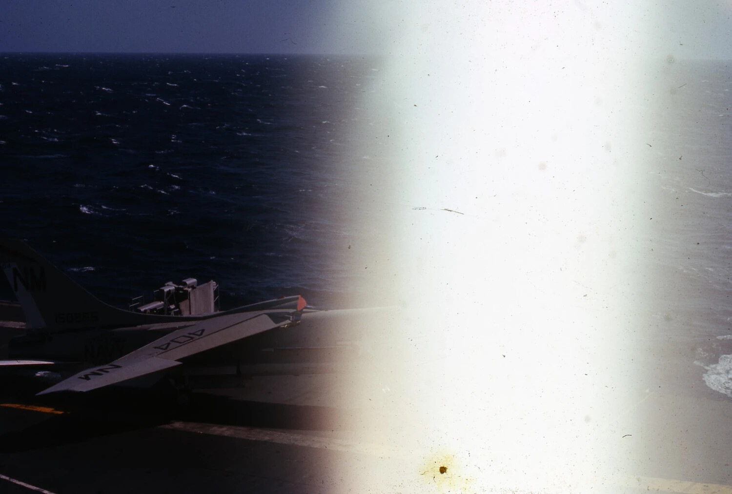 Navy Jet Tail Section on Flight Deck, USS Ticonderoga, Vietnam War Era (Light-Leaked Slide)