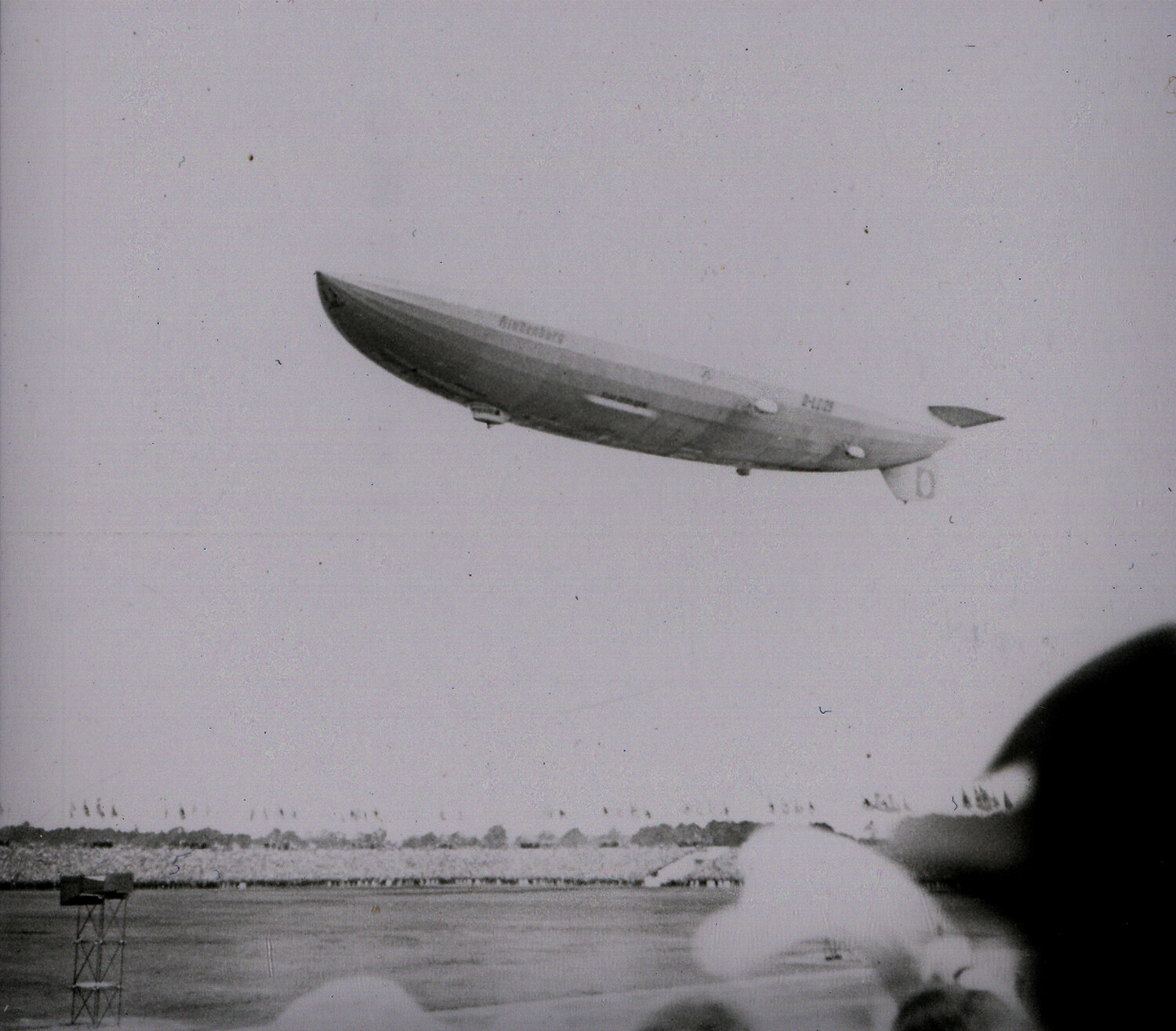 The Airship Hindenburg (LZ 129) in Low-Altitude Flight Over a Crowd, Believed Nuremberg, Germany, 1936