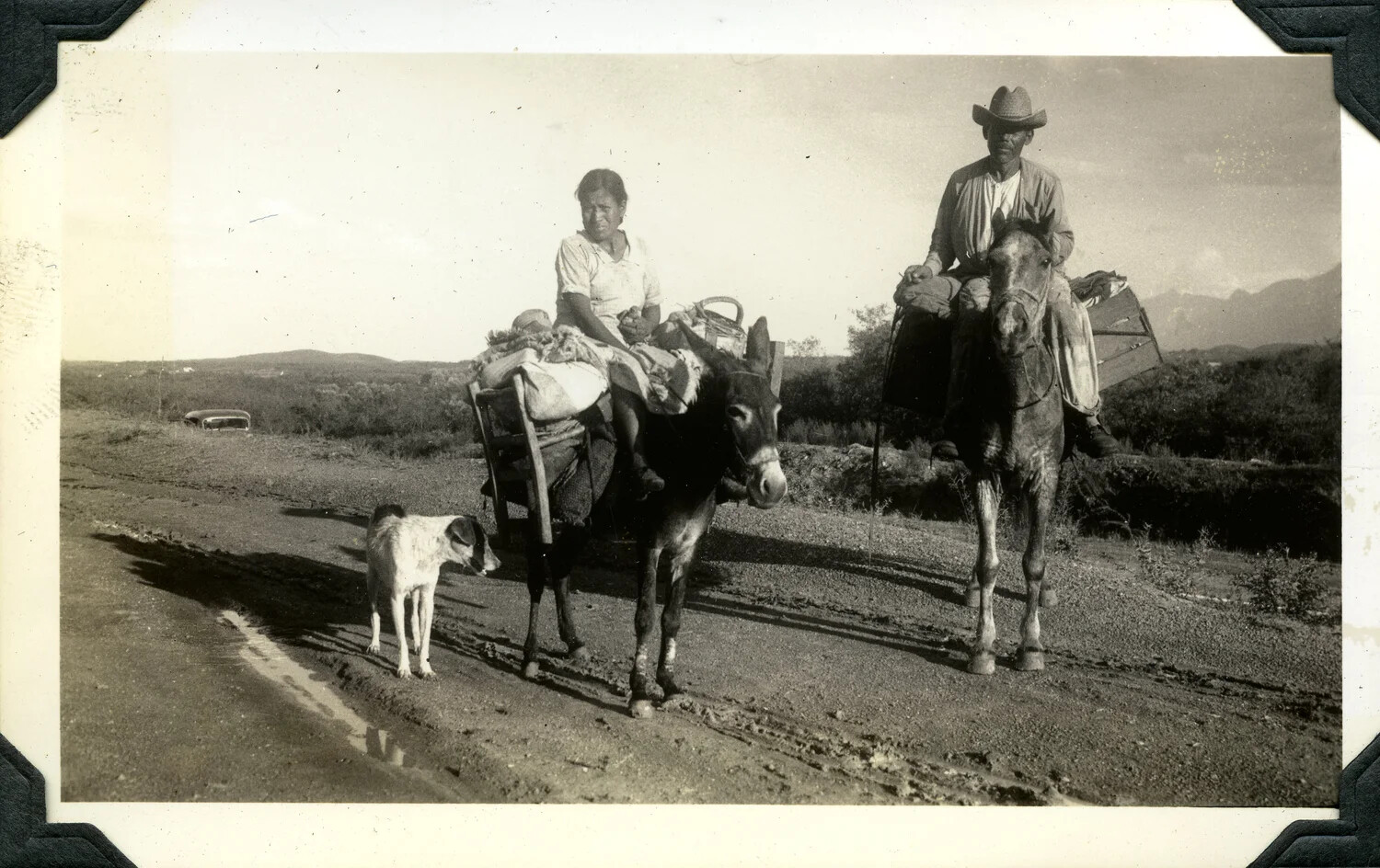 Rural Travelers with Loaded Pack Animals on a Dirt Road, Southwest/Mexico Border Region