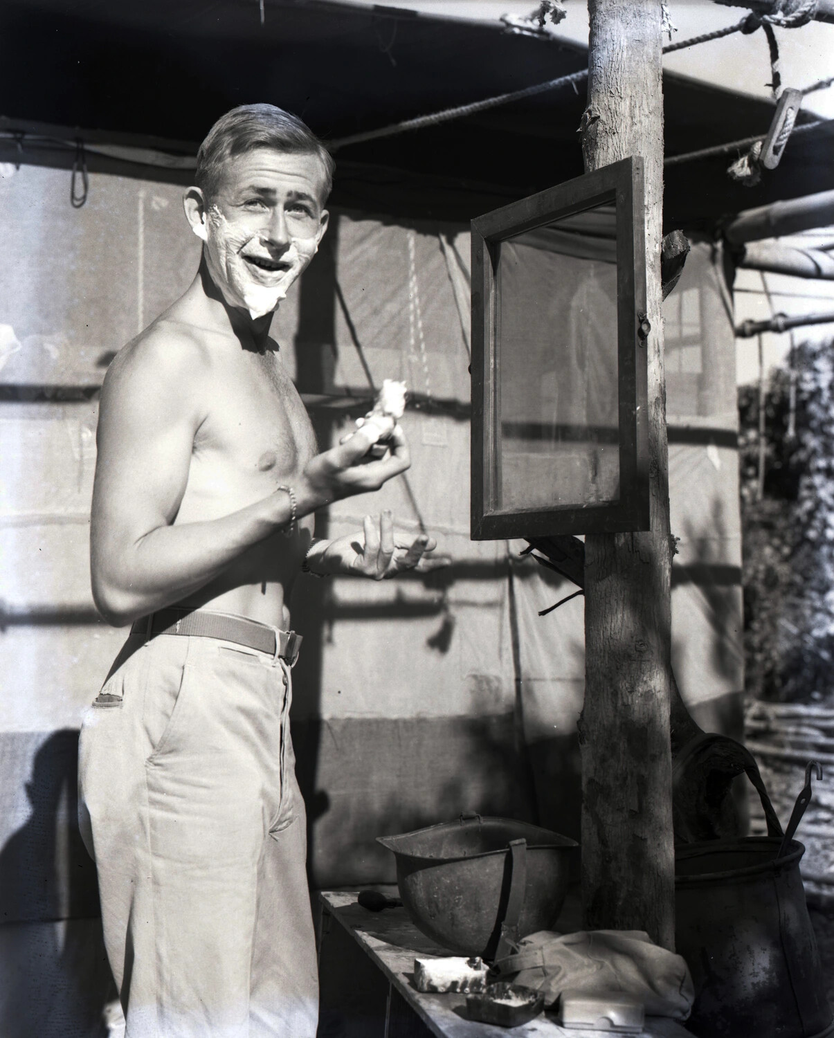 Serviceman Shaving at Outdoor Camp Washstand, China-Burma-India Theater, WWII