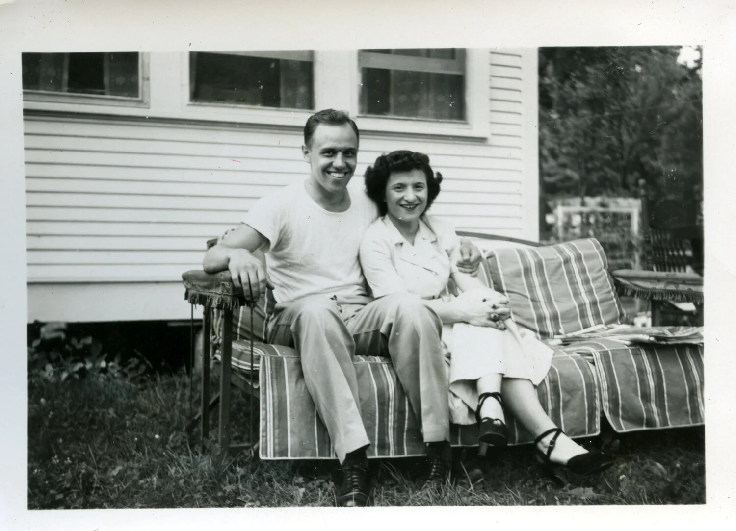 Young Couple on Outdoor Sofa, Pensacola, Florida, April 1949 — Lt. Bancroft Personal Collection