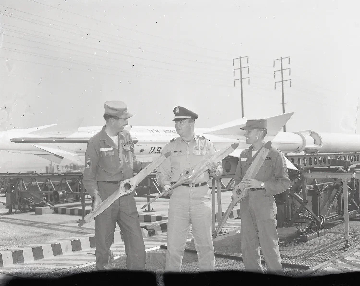 Army Personnel with Target Drone Propellers Beside Nike Missile Launcher, Air Defense Site
