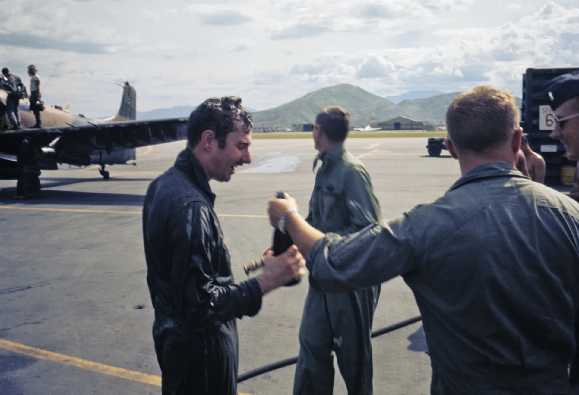 Pilots Celebrating a Fini Flight or Milestone Mission on the Flight Line, Vietnam War