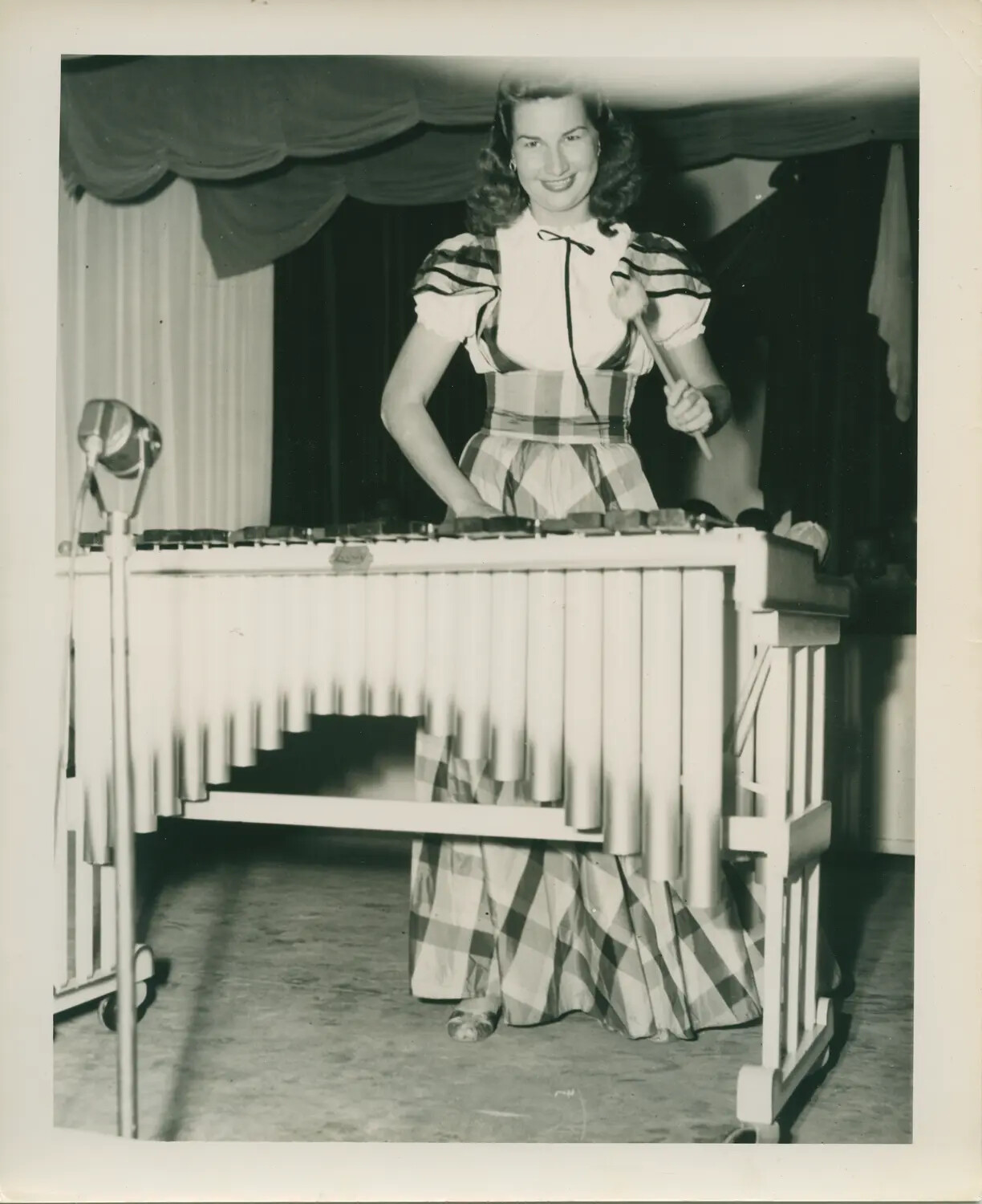 Woman Performing on Marimba, Stage Photograph -- USS Petrof Bay (CVE-80) Collection, WWII Era