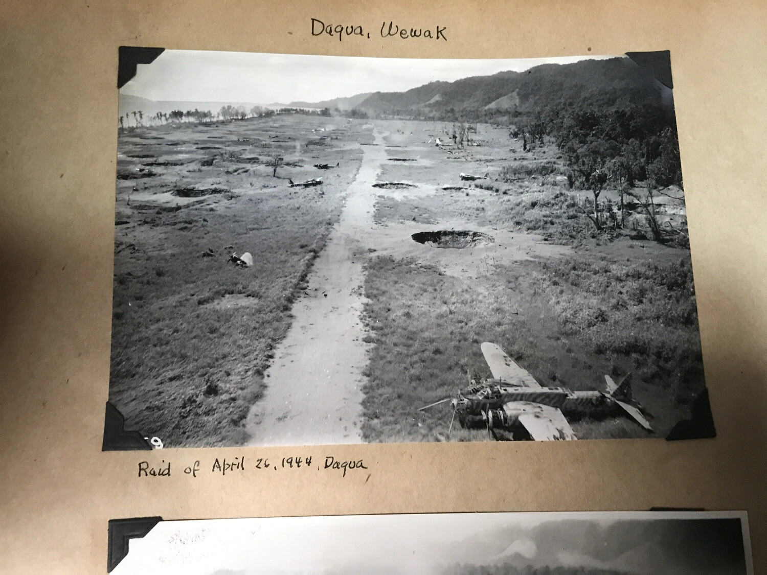 Bomb-Damaged Airstrip at Dagua, Wewak, New Guinea - Raid of 26 April 1944 (Album Photograph with Period Captions)
