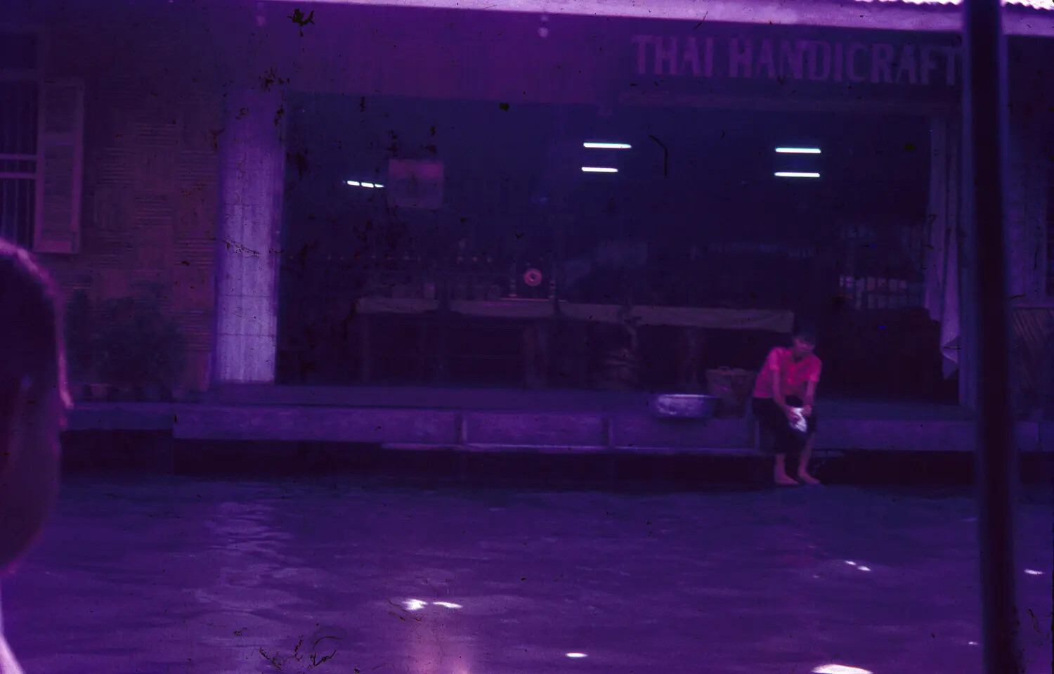 Nighttime Storefront, 'Thai Handicraft' Shop (Color-Shifted Slide, Vietnam War Era Southeast Asia)