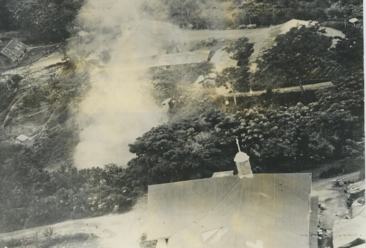 Aerial Strike Photograph, Village Target with Smoke Plume and Church Cupola, 312th Bomb Group, WWII Pacific Theater