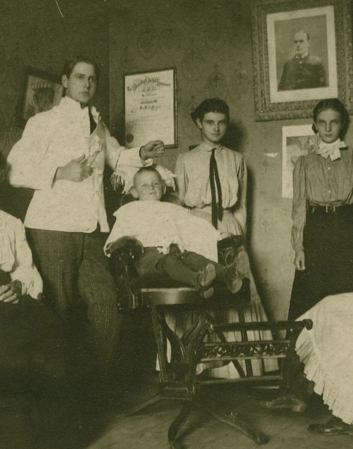 Early 1900s Barbershop or Dental Office Family Portrait (Filed Under WWII B-24 Folder)