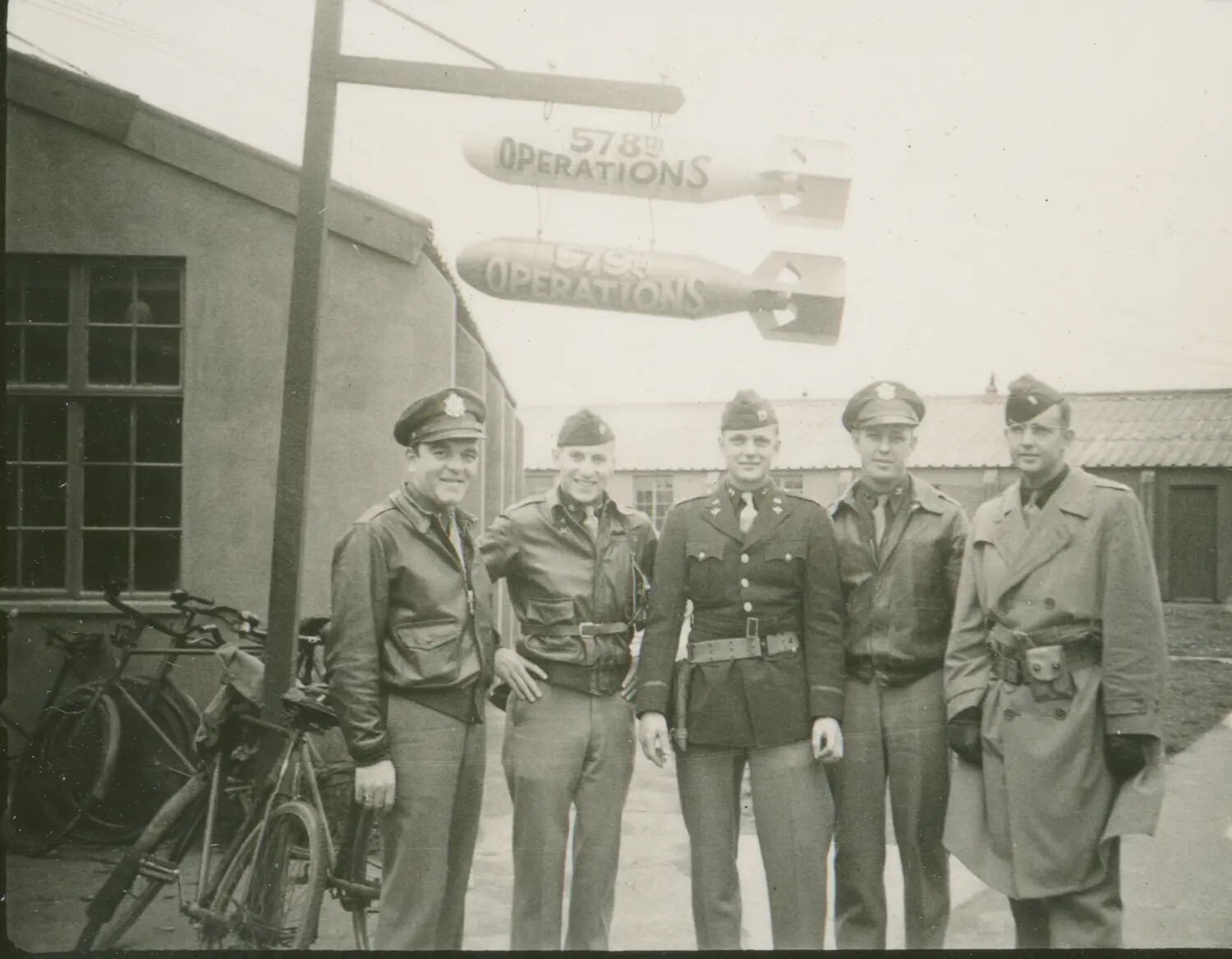 579th and 578th Bomb Squadron Operations Signs with Officers, WWII