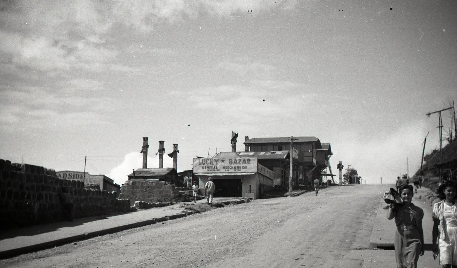 Street View of 'Lucky Bazar' General Merchandise Store, Luzon, Philippines, WWII Era