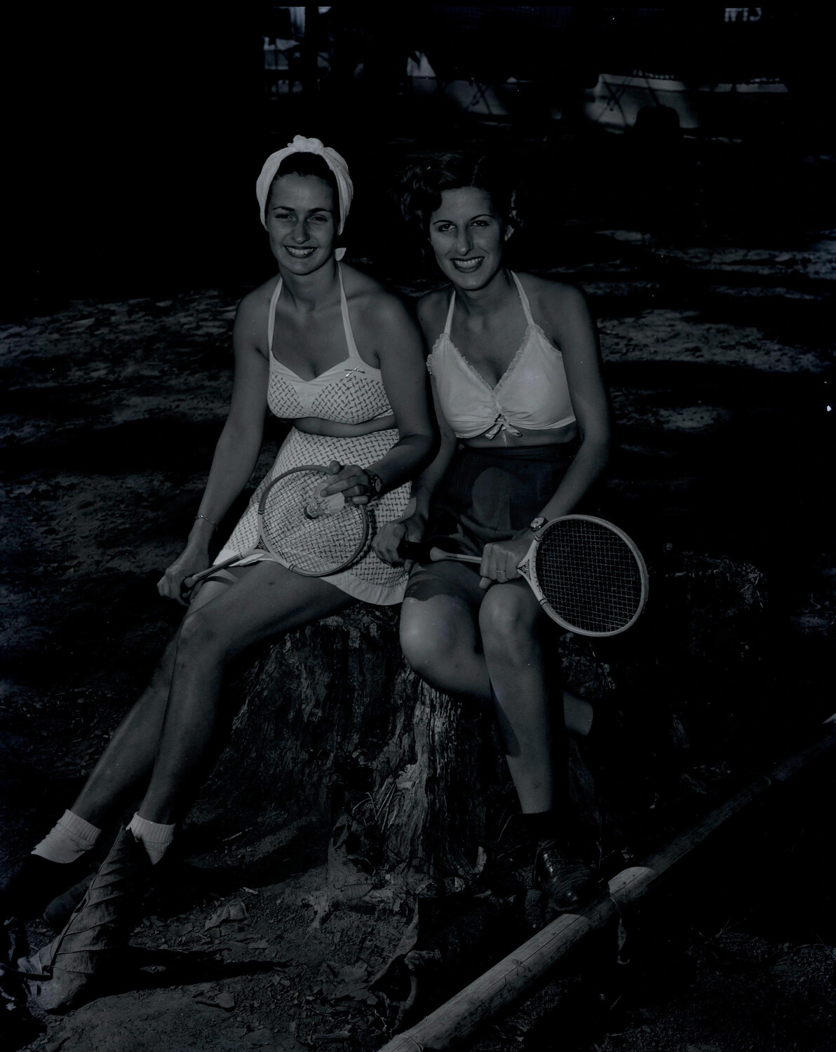 Two Women in Recreational Attire Posing with Badminton Rackets, Myitkyina, Burma, WWII China-Burma-India Theater