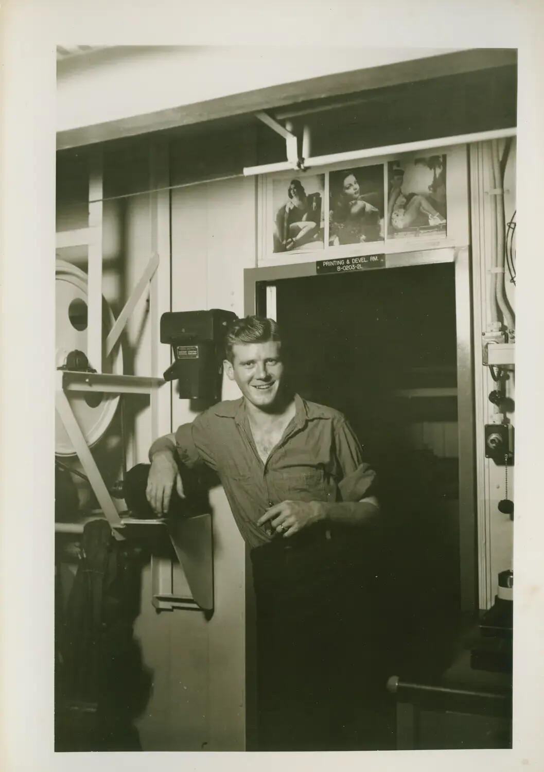 U.S. Navy Photographer's Mate in Ship's Photo Lab Aboard USS Petrof Bay (CVE-80), WWII