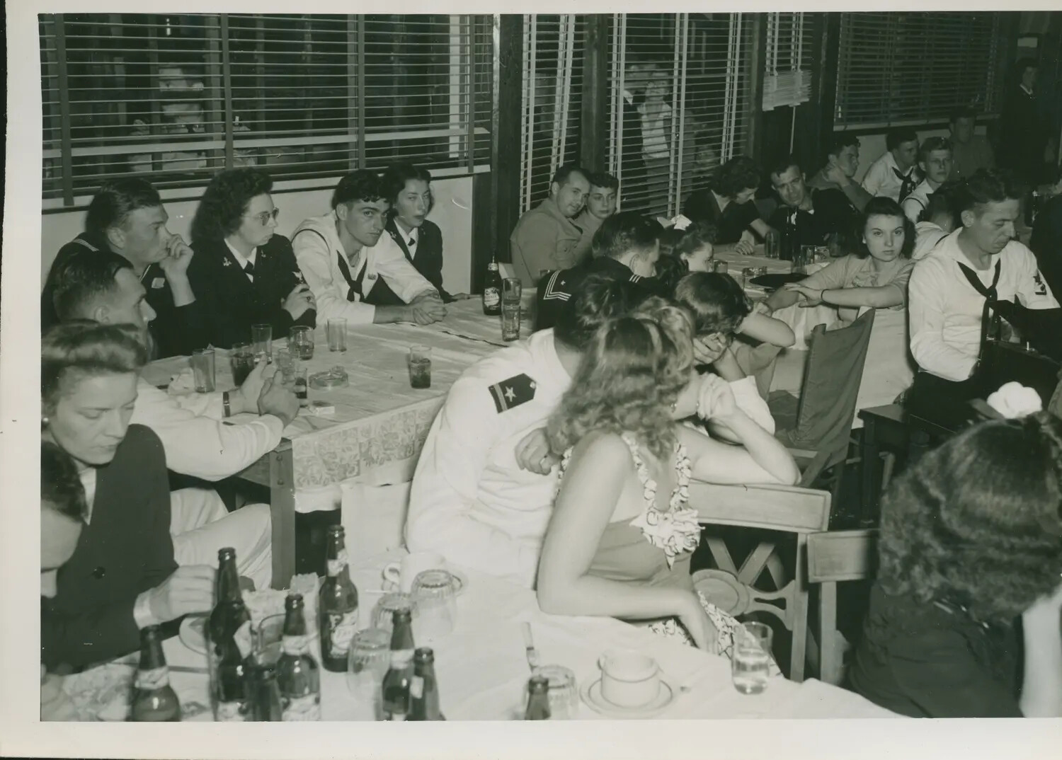 Sailors and Guests at a Social Gathering, USS Petrof Bay (CVE-80) Crew, WWII Era
