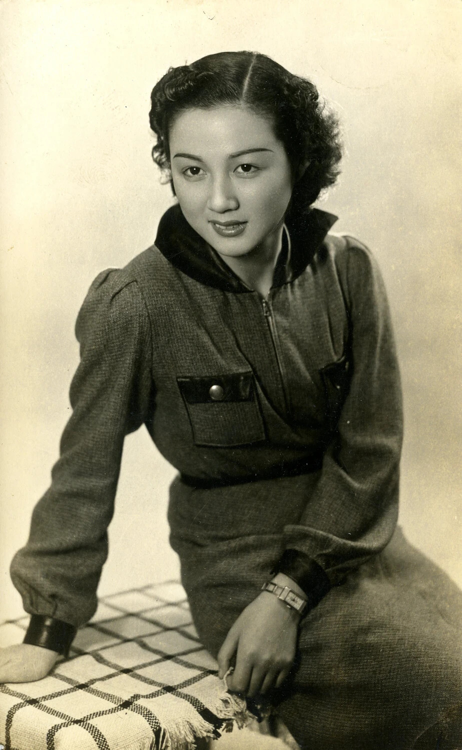 Studio Glamour Portrait of a Young Woman in Tailored Jacket-Dress, WWII Era