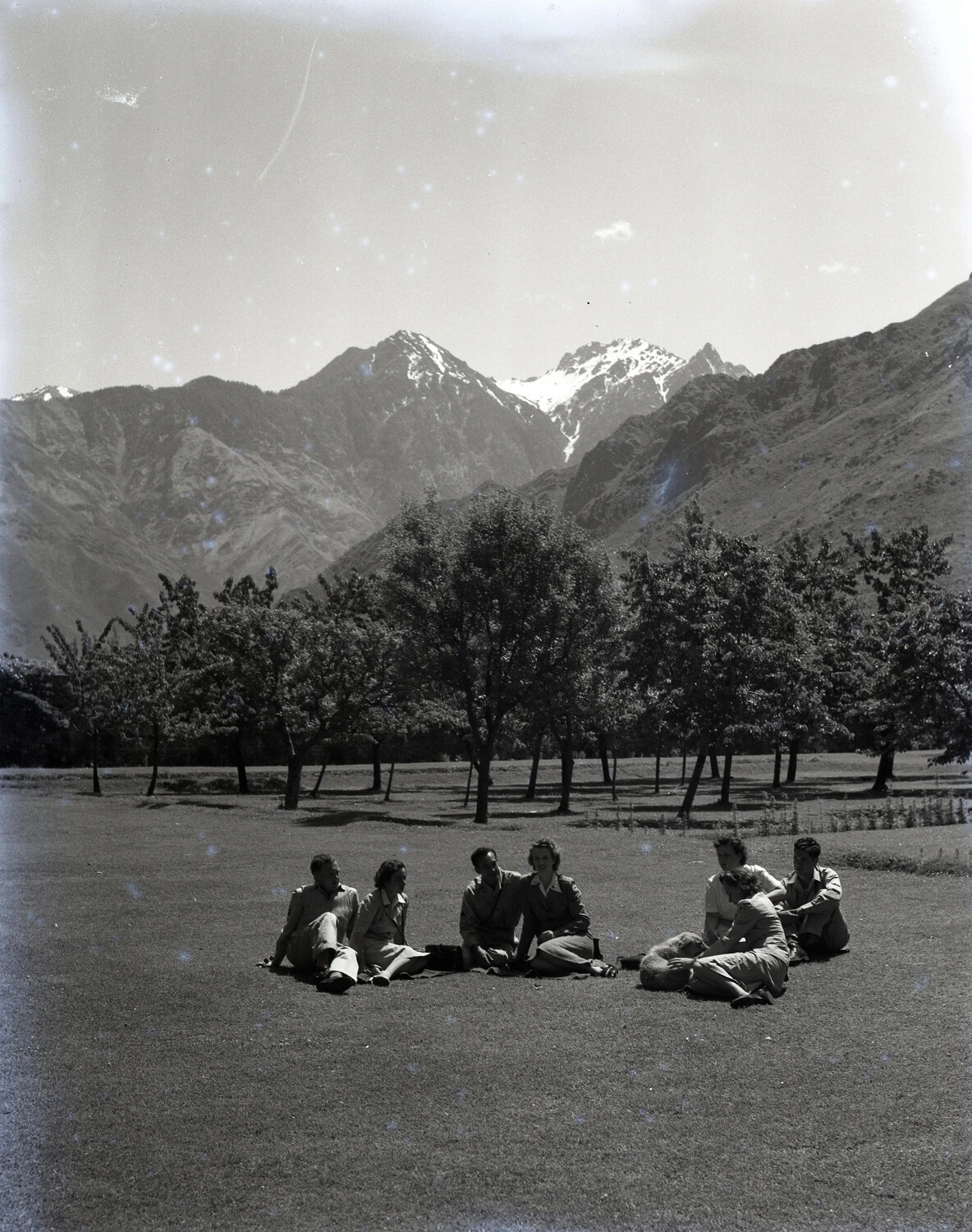 Group Portrait on Lawn with Himalayan Mountain Backdrop, Kashmir