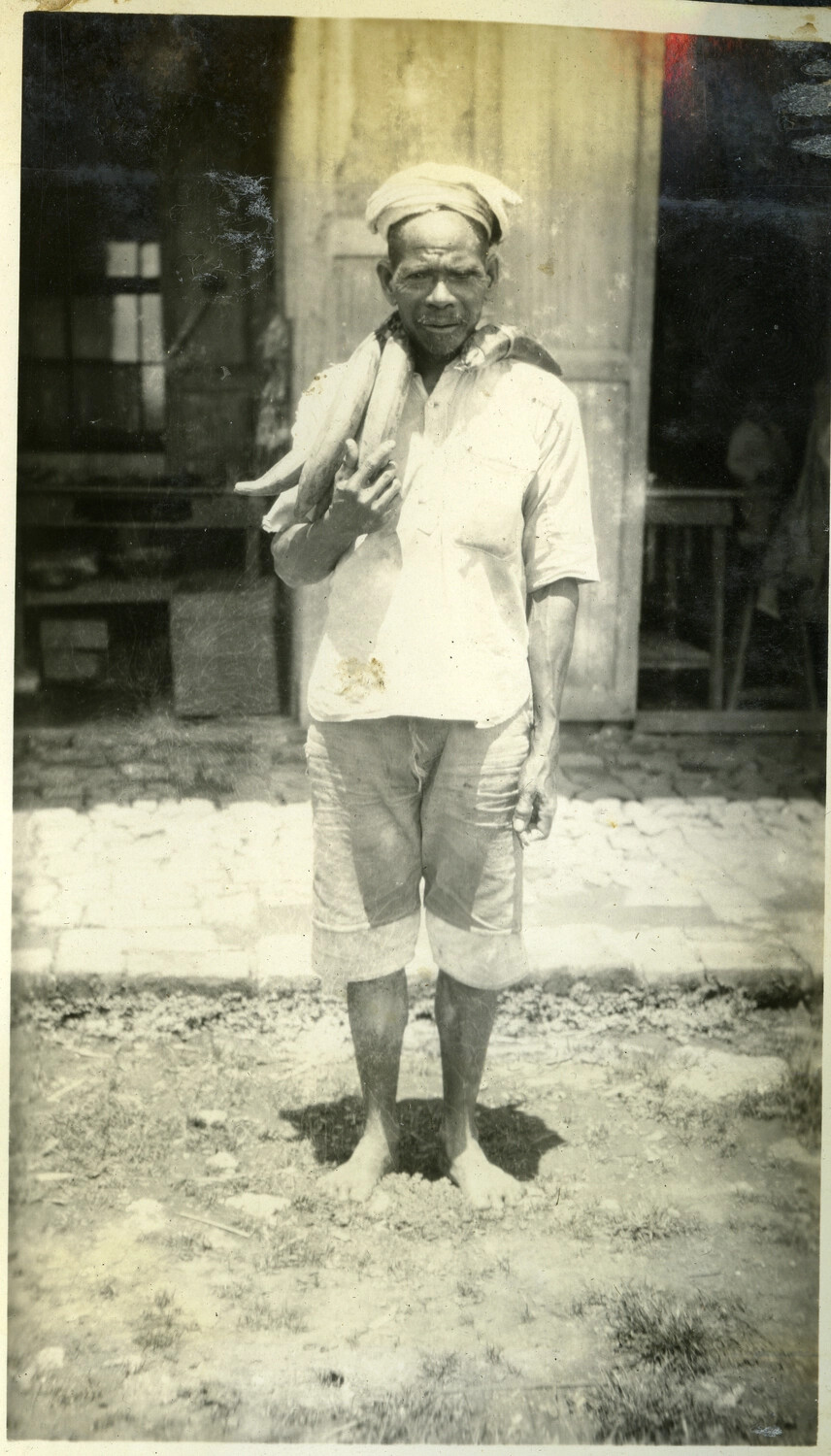 Portrait of an Elderly Man Carrying a Bunch of Bananas, Rural Philippines, c. 1920s-1930s